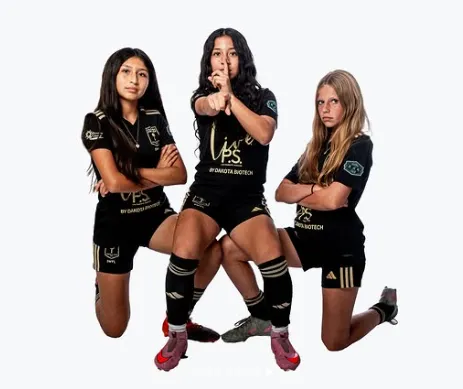 Three competitive female soccer players posing confidently in black and gold Braden River kits, representing strength and teamwork.